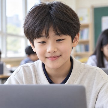 A primary school student in South Korea at a laptop